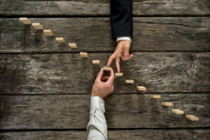 finger providing support on stairs