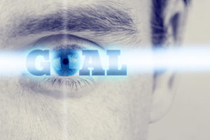 futuristic image with word goal using human eye as the letter o. conceptual of business, education or life goals.