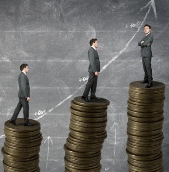 business man in suit standing on top of money with arrow pointing upward