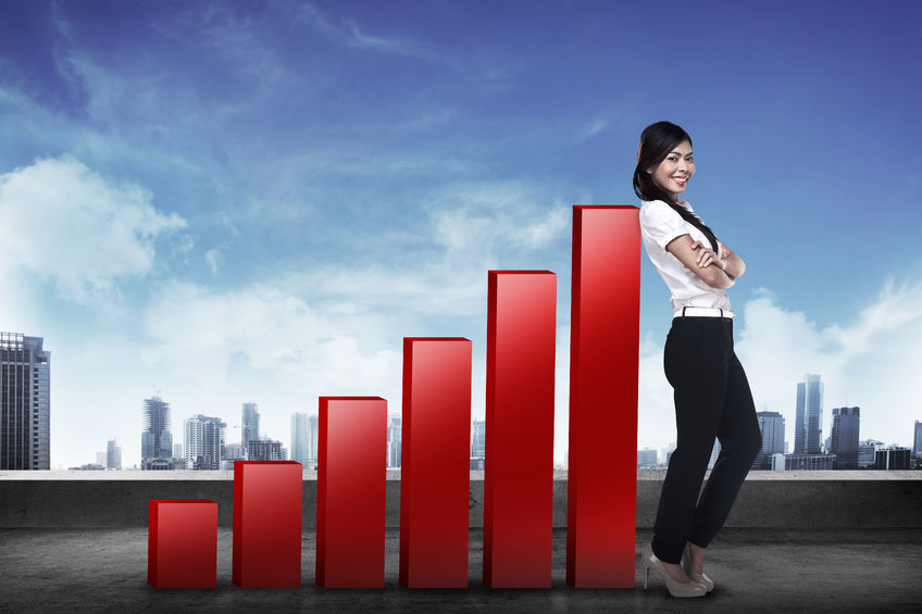 asian business woman lean on increasing graph